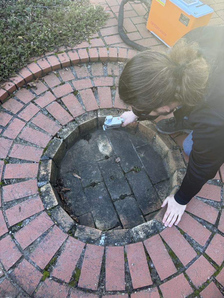 Laser cleaning of soot-covered bricks